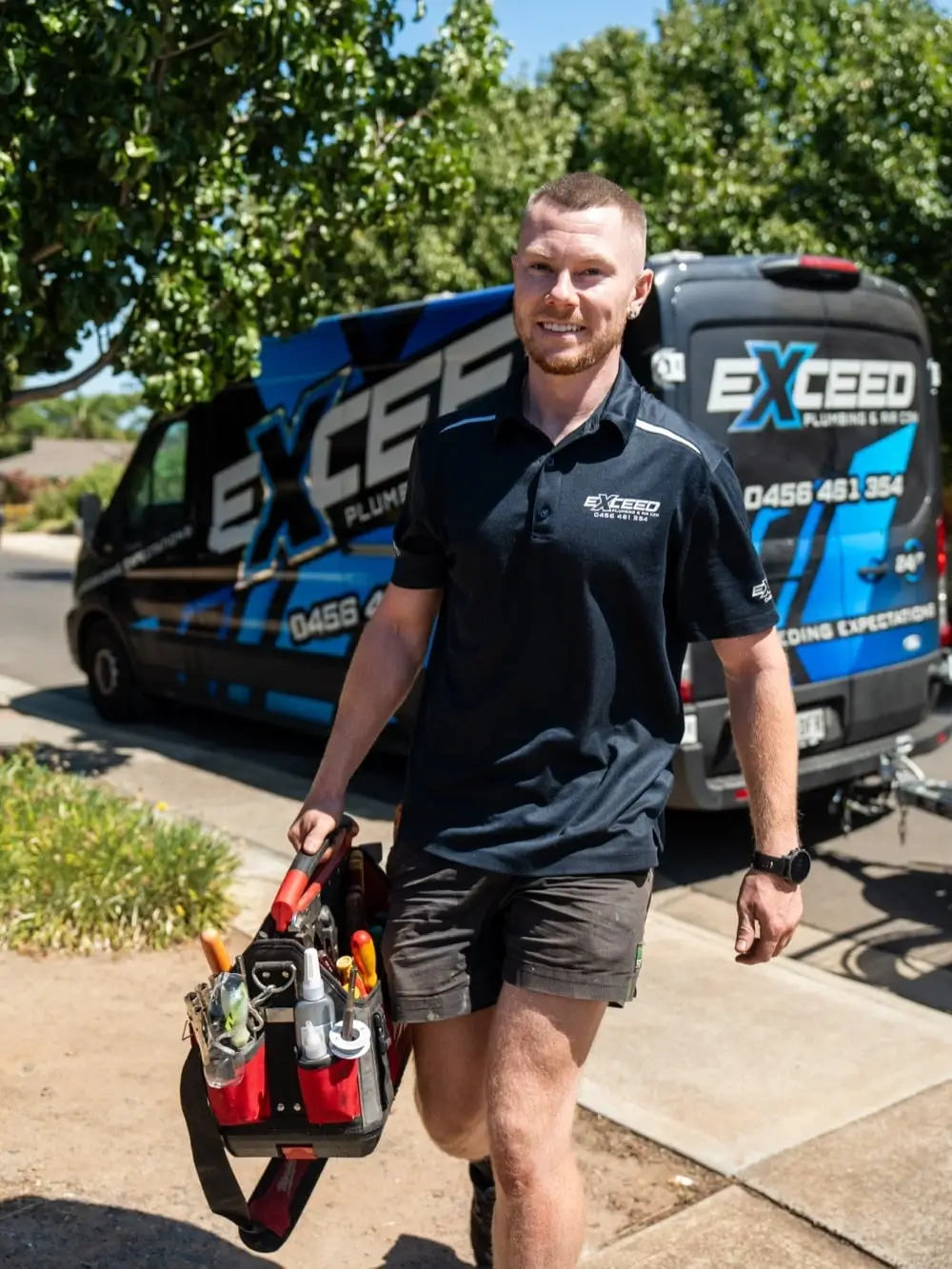 A Proximity Plumbing van arriving at a job